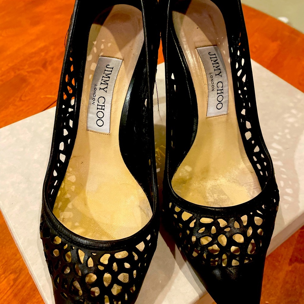 Black Jimmy Choo pumps in good condition.